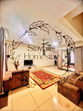Astana Townhouse Homestay BukitBeruntung livingroom AirCond